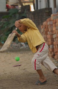 Time for a cricket break near a Compassion center in India.